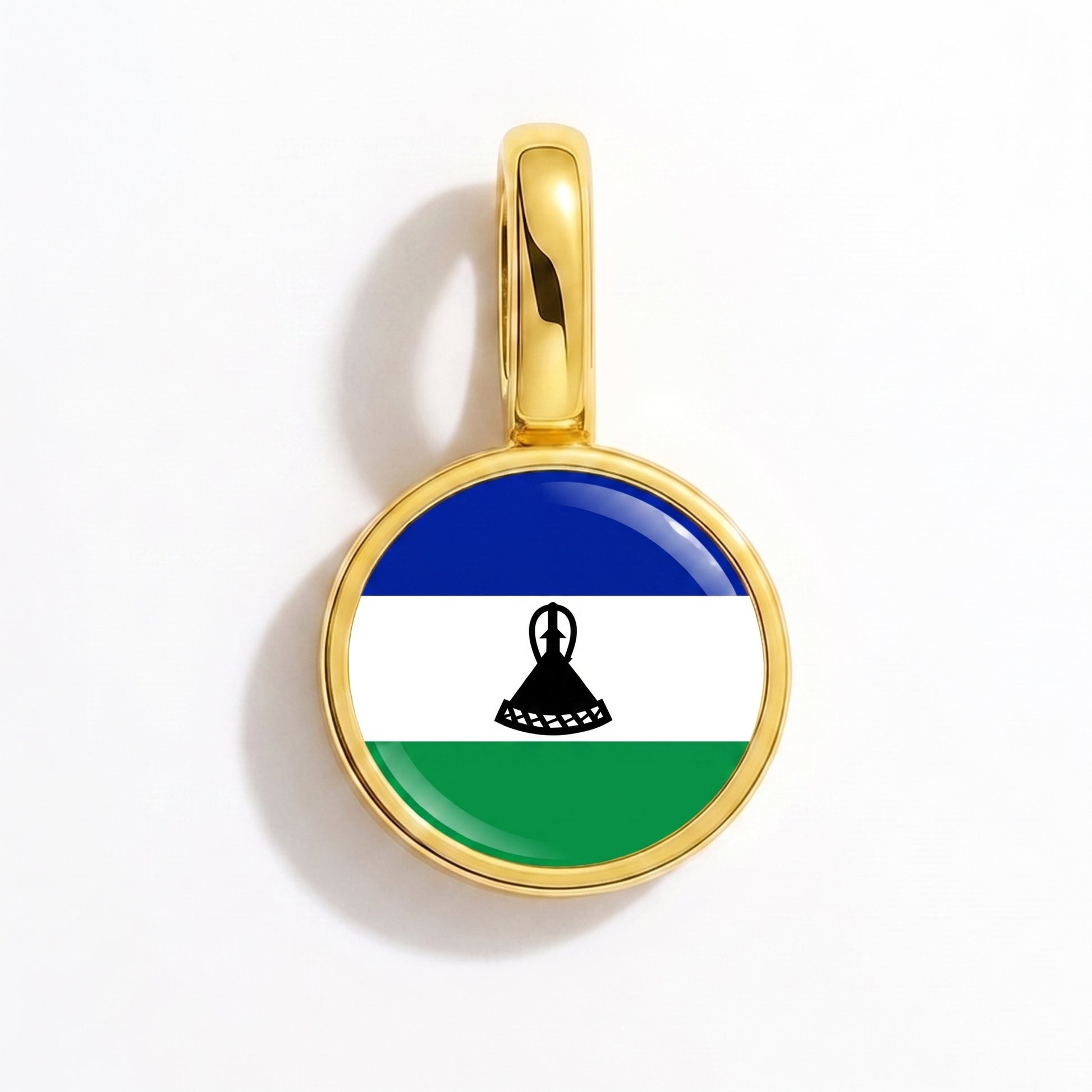 Charm bandera Lesoto – redonda oro